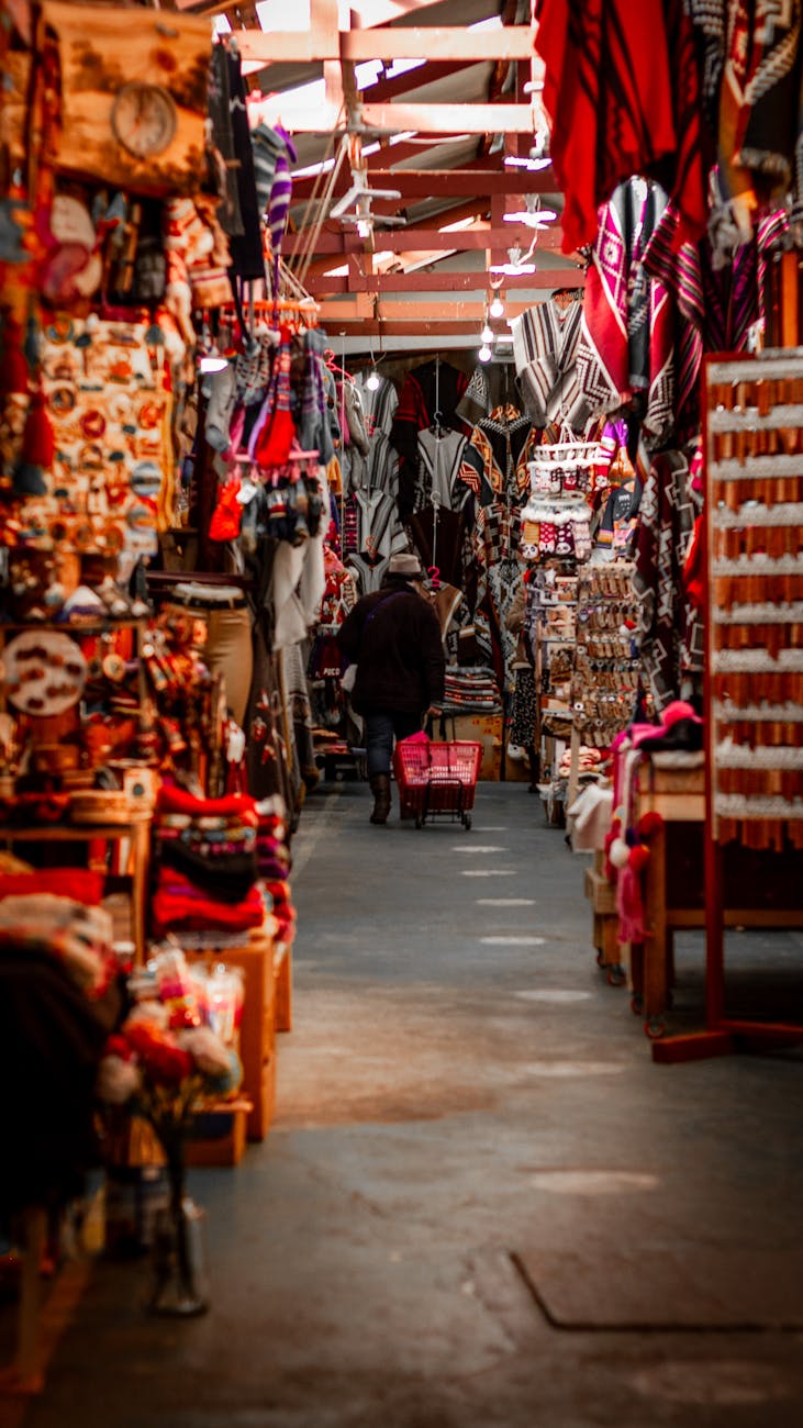 elderly person walking at bazaar